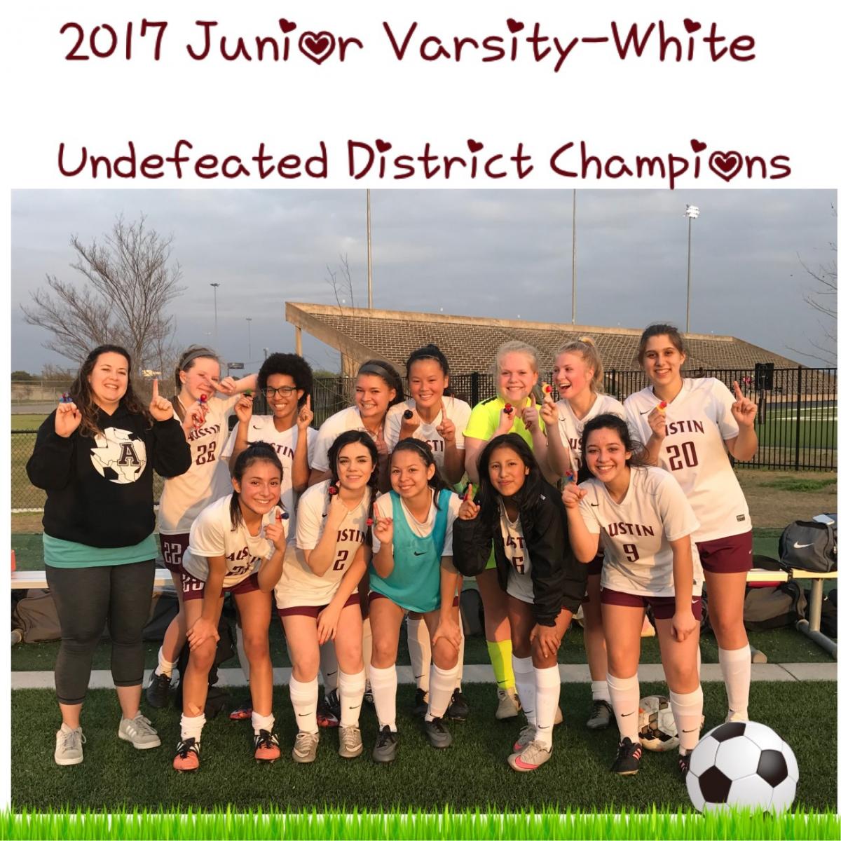 JV White Wins District