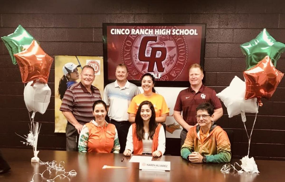 Karen Alvarez signs her letter of intent to play golf at the University of Texas - Dallas