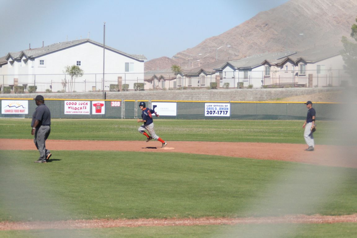 The spark plug Jason Winters rounds first on a pass ball and ends up scoring on heads up base running to give us a 1-0 lead